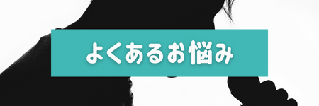 マイクをもった人